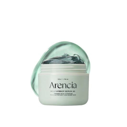 Skincare product with a clear gel-like substance on a white background.