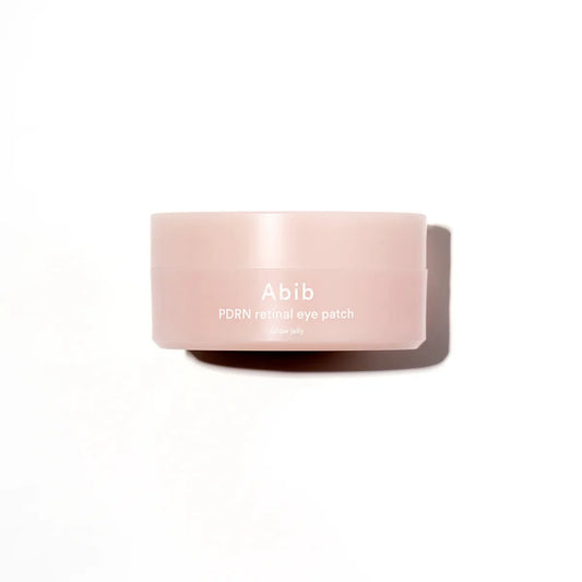 Pink container labeled 'Abib PDRN retinal eye patch' on a white background