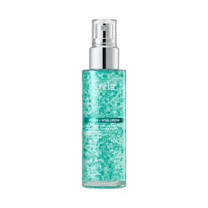 Anua PDRN Hyaluronic Acid Hydrating Capsule Mist bottle showing emerald green oil capsules in clear serum.