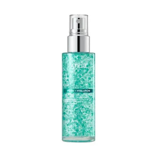Anua PDRN Hyaluronic Acid Hydrating Capsule Mist bottle showing emerald green oil capsules in clear serum.