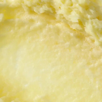 Macro detail of the dense, fluffy soufflé-to-foam texture of Axis-Y Kojic Yuzu Pack Cleanser.