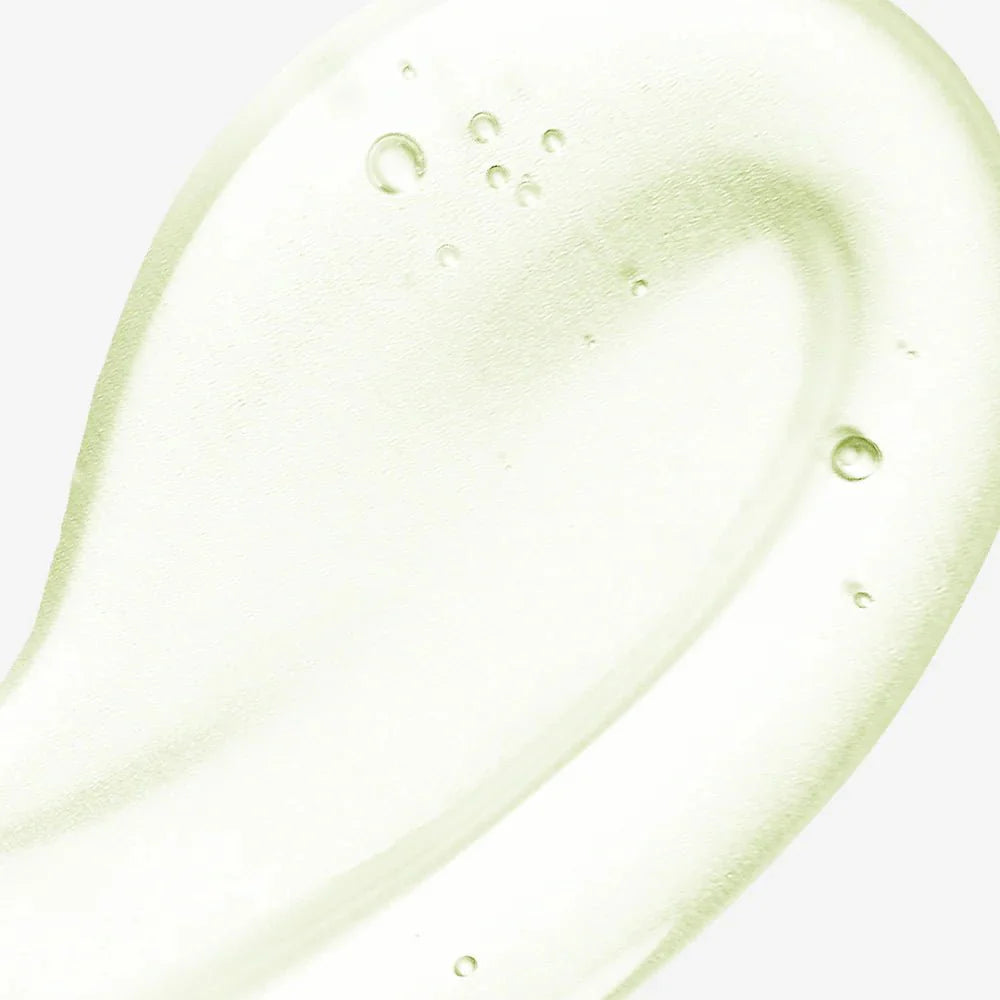 Close-up texture shot of a clear, lightweight, and cooling gel-like serum with small air bubbles.