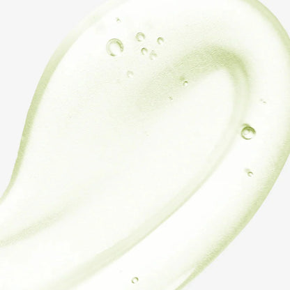 Close-up texture shot of a clear, lightweight, and cooling gel-like serum with small air bubbles.